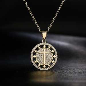 18K gold plated copper necklace with a circular zircon cross pendant on black silk