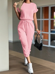 Pink casual two-piece lounge set with short sleeve top and high-waisted drawstring pants