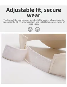 Detailed view of adjustable Velcro strap on beige outdoor ponytail baseball cap