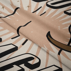 Close-up of soft plush fabric texture with vintage starburst and bold letter printing