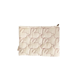 Quilted rabbit pattern cosmetic bag with zipper closure and lightweight fabric design