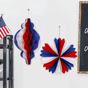 Patriotic red white and blue honeycomb paper fans and star decorations for party