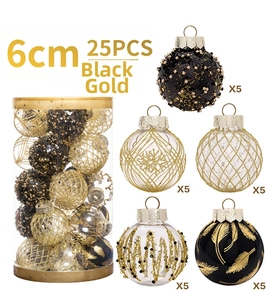 Macro view of 6cm black and gold Christmas balls with glitter and snowflake textures