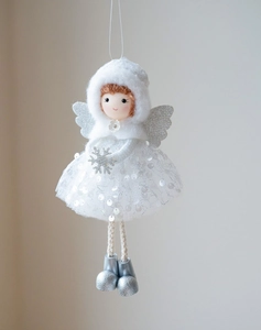 Detailed view of plush angel ornament with silver wings, sequins and mesh skirt