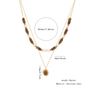 Detailed view of layered gold necklace with bead specs and stainless steel dimensions