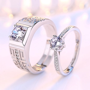 Adjustable silver couple ring set with six-prong round stone and square solitaire