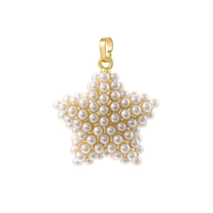 Detail of a gold star pendant with dense white pearl inlay on a polished metal base