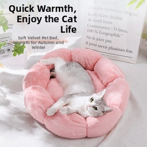 Detail of flower-shaped pink faux rabbit fur pet bed with soft and fluffy plush texture