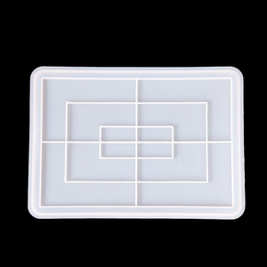 Detailed top view of a rectangular tiered silicone mold for DIY resin tray making