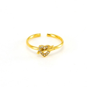 Detail of adjustable gold ring featuring a sparkling rhinestone-set Cupid arrow heart