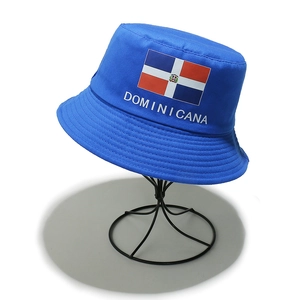 Detailed view of the Dominican flag and Dominicana text on a blue canvas bucket hat
