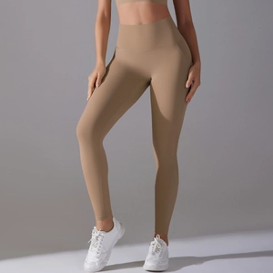 Macro detail of khaki high-waisted seamless yoga shorts showing skin-friendly elastic fabric