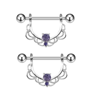 Detail of silver nipple rings with purple zircon heart and U-shaped lace design