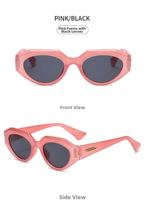 Detail of pink cat-eye sunglasses with grey lenses and gold metal temple accents