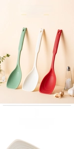 Close-up of silicone spatula with internal scale markings for precise kitchen measurement