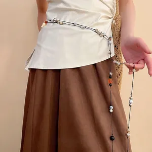 Bohemian waist chain with leather, acrylic beads, and shell pendants for a vintage ethnic style