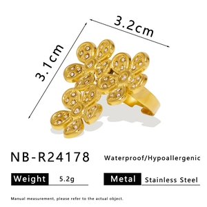 Detailed view of floral stainless steel ring showing dimensions and waterproof features