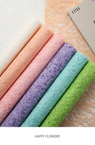 Detail showing the fibrous texture of colorful hollow paper for floral bouquet wrapping
