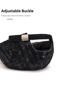 Detail of adjustable metal buckle and washed corduroy texture on the baseball cap back