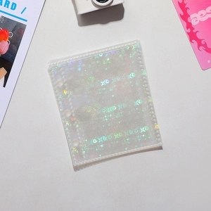 Close-up of holographic star pattern on a transparent 3-ring binder sleeve insert