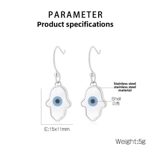 Detail view of Hamsa Hand evil eye earring made of stainless steel and shell, 15x11mm