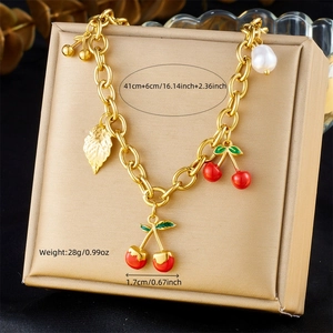 Gold cherry and pearl pendant necklace for women on display with size information