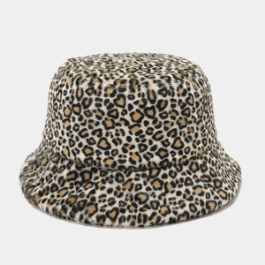 Close-up detail of plush leopard print faux fur texture on a winter bucket hat