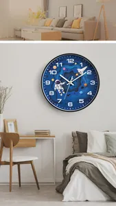 Detail of a 3D paper-cut style astronaut clock with spaceship and planet elements
