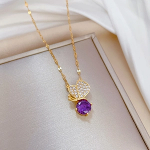 Luxury gold titanium butterfly necklace with purple gemstones and crystals on O-chain