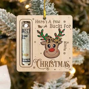 Close-up of reindeer money holder ornament with leopard bow and custom name detail