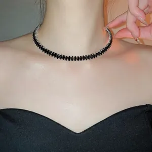 Rhombus black zircon collar necklace with silver-tone metal finish on female model