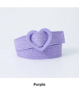 Detail of purple woven elastic belt featuring a textured heart-shaped buckle for dresses