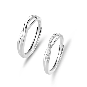 S925 sterling silver Mobius rings for couples featuring a sleek twist and diamond accents