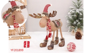 Detailed view of plush Christmas reindeer with knitted hat and festive scarf ornaments