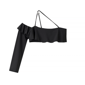 Detail of black one-shoulder top featuring ruffled frills and asymmetrical long sleeve