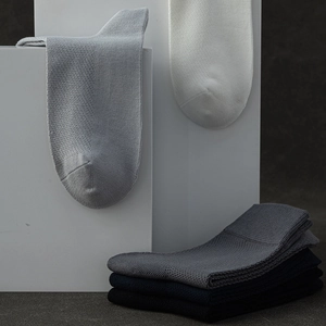 Mesh breathable men cotton business crew socks in multiple colors on geometric blocks