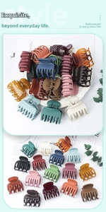 Detailed view of matte and glossy hair claws in various Morandi colors for daily hair styling