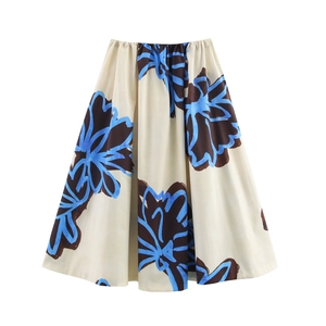 Elegant A-line maxi skirt with blue and brown abstract floral print on beige woven fabric