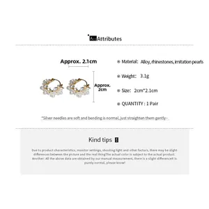 Detailed size specifications of flower earrings with pearls and crystals measuring 2.1cm