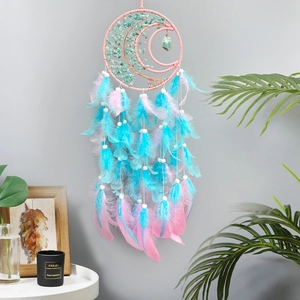 Pink and turquoise dreamcatcher with Tree of Life design and hanging feathers