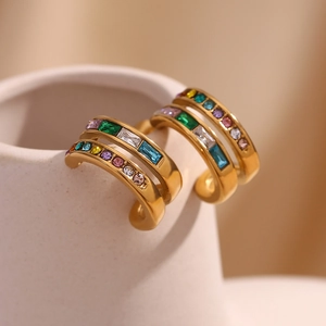 Macro shot of 18K gold plated double C-hoop earrings with multicolored cubic zirconia