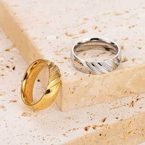 Striped stainless steel rings with zircon stones in gold and silver finish set
