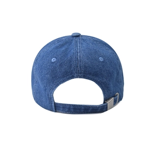Close-up of the vintage washed navy denim baseball cap showing the adjustable metal strap