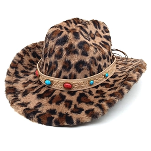 Detail of leopard print cowboy hat featuring turquoise and ruby studded woven band