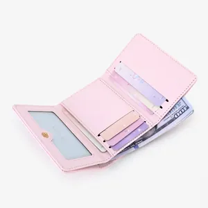 Pink PU leather tri-fold wallet for women with multiple card slots and clear ID window