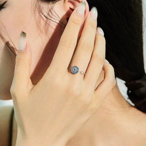 Close-up of S925 silver adjustable ring with blue evil eye heart zirconia design