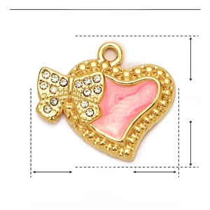 Macro view of pink enamel heart pendant with crystals and dimensions 19mm x 16mm