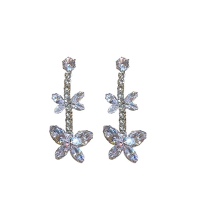 Silver zircon butterfly tassel earrings with shimmering crystals on a clean white background