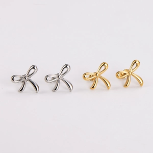 Elegant bow knot stud earrings in gold and silver finish on a clean white background
