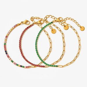 Detailed view of three gold-plated stainless steel bracelets with colorful zircon stones